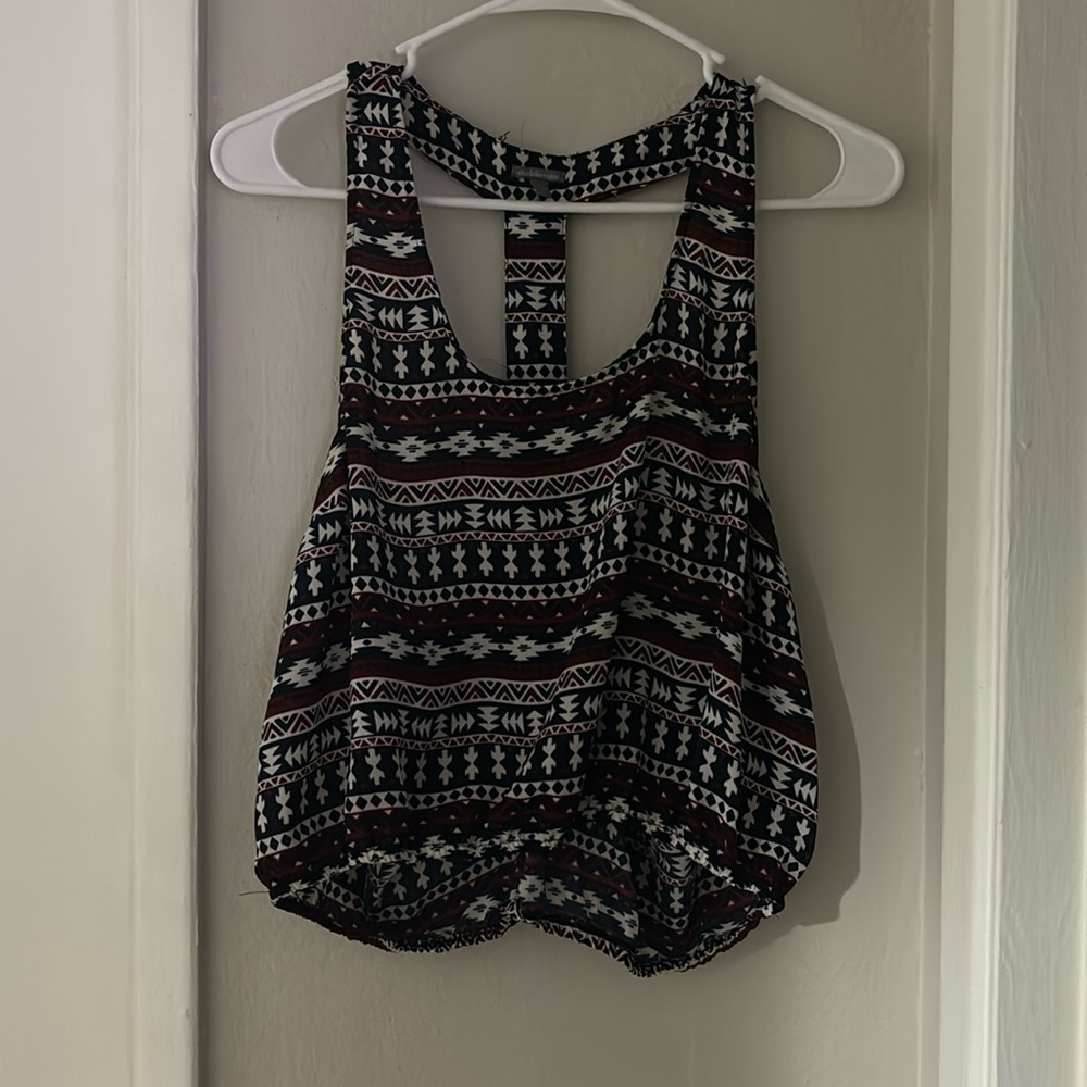 Colors are maroon blue and white. Size XL. Fits like a medium/small